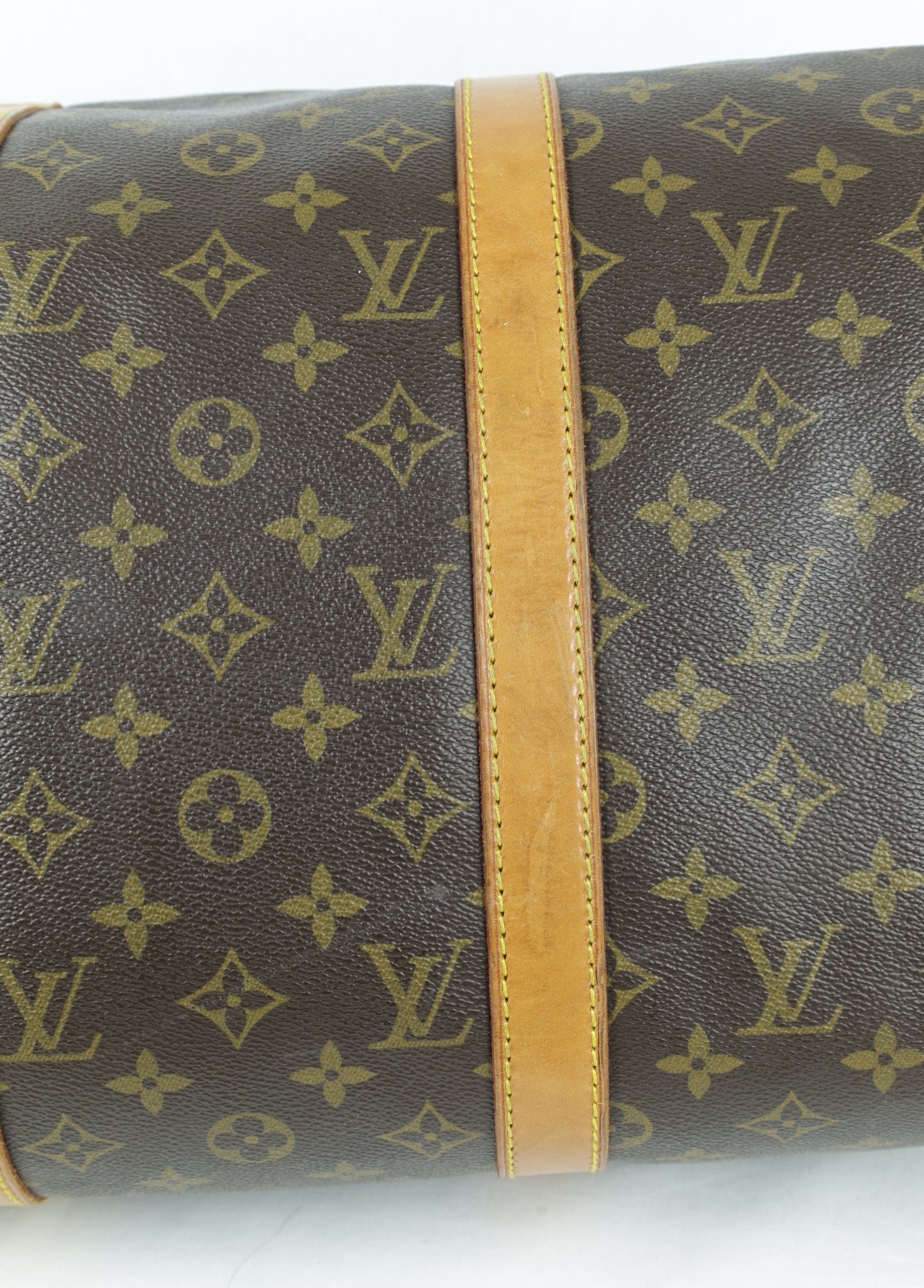 Vintage Louis Vuitton KeepAll 50 onderkant patina2 Laulau Treasures
